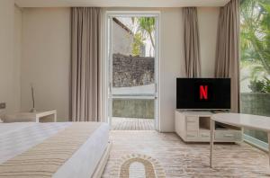 TV/Unterhaltungsangebot in der Unterkunft Taman Mesari Luxury Villas-Seminyak