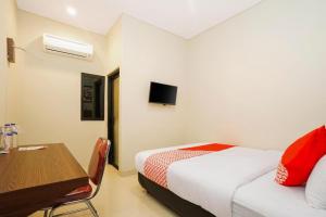 Letto o letti in una camera di The Colins Hotel