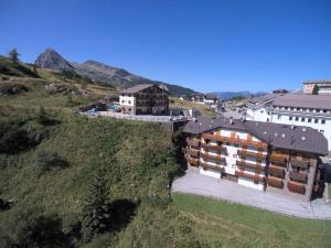 an overhead view of a building on a hill at Apartment in Passo Rolle/Südtirol 23444 in Passo Rolle