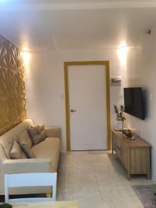 TV a/nebo společenská místnost v ubytování 2BR Condo at Banilad Cebu 649
