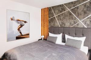 Postel nebo postele na pokoji v ubytování Andreas-Dirks-Str-5-2-OG-Wohnung-203