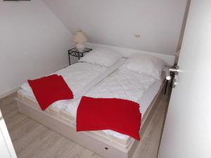 Postel nebo postele na pokoji v ubytování Strandburg-5