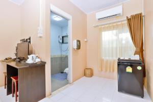 Postel nebo postele na pokoji v ubytování Aonang Privacy Resort