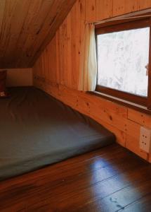 Ein Bett oder Betten in einem Zimmer der Unterkunft Hillside House Mộc Châu
