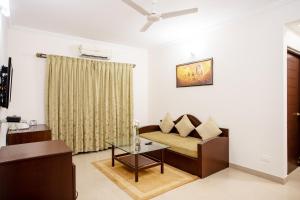 Goa Villagio Resort & Spa - A Unit of IHM, 10 Min Walk from Beach的休息区