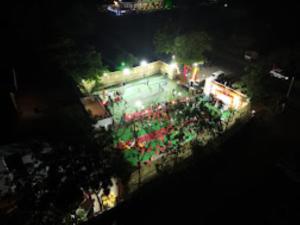 an overhead view of a festival at night at Hotel Maharana Palace,Maheshwar in Maheshwar