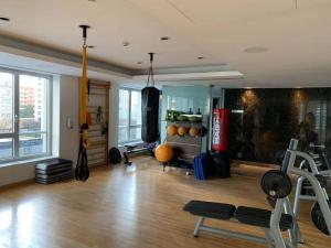 a room with a gym with exercise equipment in it at Puerto Madero Apartamento Piso Entero de 650m2 Panorámico y Sofisticado in Buenos Aires