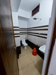 Koupelna v ubytování Karthika Homes
