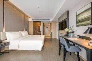 Телевізор і / або розважальний центр в Atour Hotel Hefei USTC Huangshan Road