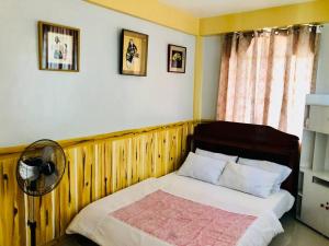 Postelja oz. postelje v sobi nastanitve Baguio Exotic Vacation House
