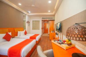 Voodi või voodid majutusasutuse Yog Wellness Resort & Spa By Amritara toas