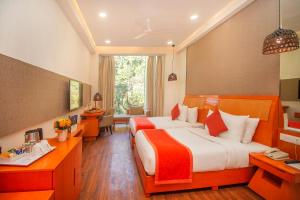 Voodi või voodid majutusasutuse Yog Wellness Resort & Spa By Amritara toas