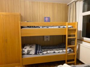 Postel nebo postele na pokoji v ubytování FeWo Panoramablick mit Pool und Sauna inklusive + 22 fotografií