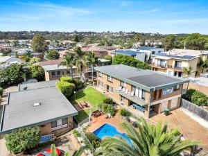 an aerial view of a house with a swimming pool at Marine Court - Unit 6 in Merimbula