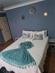 Postel nebo postele na pokoji v ubytování UP 2 DATE GUESTHOUSE