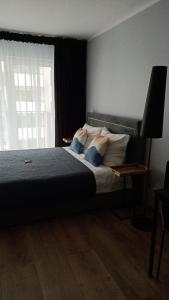 Cama o camas de una habitación en Apartament RedaCity