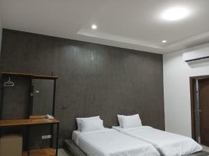 Postel nebo postele na pokoji v ubytování 22 Twenty-Two Hotel ทะเวนตี้-ทู โฮเทล + 7 fotografií