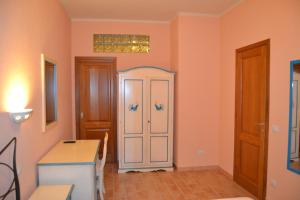 Postel nebo postele na pokoji v ubytování B&B La Pavoncella