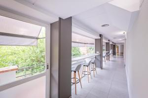 A balcony or terrace at HOTEL LA PERLA