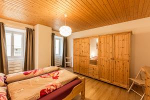 Postel nebo postele na pokoji v ubytování Chasa Silvretta