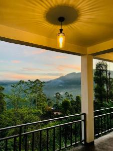 a view from the balcony of a house at The Station Lodge in Haputale