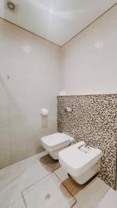 Um banheiro em Apartamentos Sol & Ria