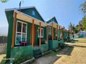 a green house with a green at The Wild Farms By Gwestai in Masinagudi +12 photos