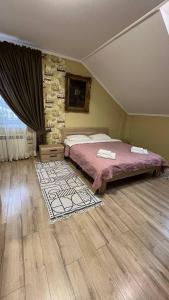 Postel nebo postele na pokoji v ubytování Art house Hostel