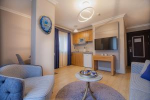 A television and/or entertainment centre at La Palace Exclusive Design