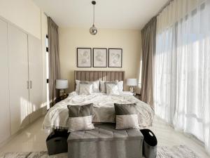 Postel nebo postele na pokoji v ubytování Trophy - La Dolce Vita Villa