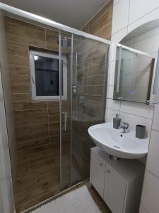 Salle de bains dans l'établissement Cozy Stay Apartments