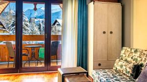 Posedenie v ubytovaní Apartament Wolny Czas