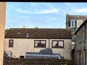 a view of a building from a window at Bright central large cosy flat in Fife