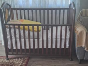 A bed or beds in a room at HOMER