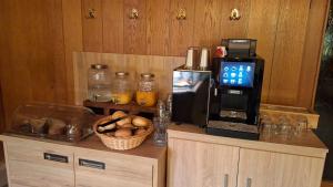 a kitchen with a coffee maker and a microwave at Tilla's Hof in Hamm