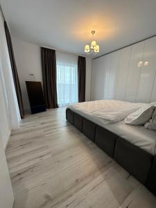Katil atau katil-katil dalam bilik di Park Boutique Apartments