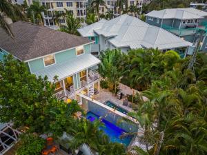 an aerial view of a house with a swimming pool at Island Time West in Siesta Key