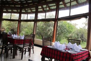 Un restaurant sau alt loc unde se poate mânca la Mara Empiris Safari Camp