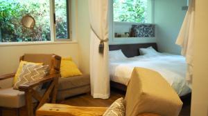 Postel nebo postele na pokoji v ubytování Yama'oto - Nature Luxury Stay