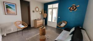 Istumisnurk majutusasutuses Appartement Duplex Vue Mer Jacuzzi Privé