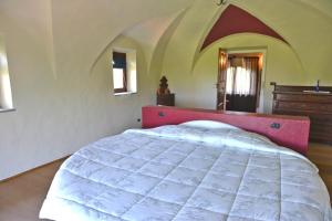 En eller flere senger på et rom på Casa Vacanze Il Brichet