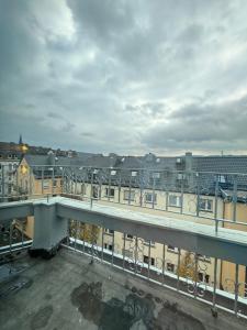 a balcony with a view of a city with buildings at H-36 RESIDENCE 1.1 in Koblenz