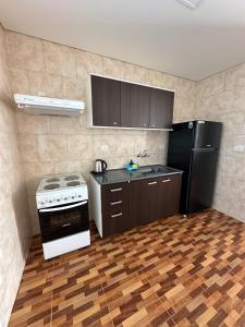 プエルト・リコにあるLas Calasのキッチン(コンロ、冷蔵庫付) +7枚の写真