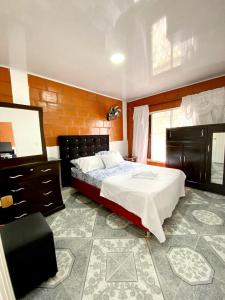Voodi või voodid majutusasutuse Casa ricardo balcazar toas