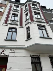 a white building with windows on it at H-36 RESIDENCE - BRIGHT Collection in Koblenz