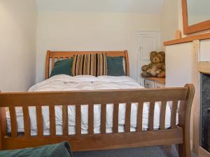 Willow Cottage tesisinde bir odada yatak veya yataklar