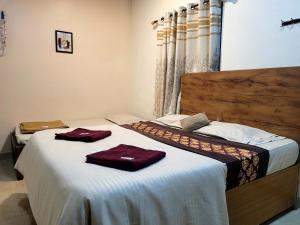 Postel nebo postele na pokoji v ubytování Sun n sand holiday home + 37 fotografií