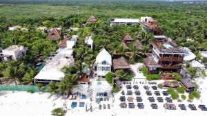 an aerial view of a resort on the beach at Posada Lamar Tulum Beach Front and Pool in Tulum