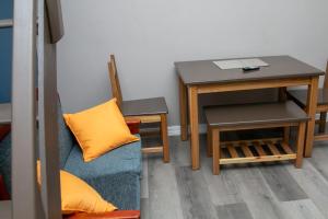 Area soggiorno di Comfi Spaces