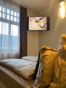 Ένα ή περισσότερα κρεβάτια σε δωμάτιο στο H-36 RESIDENCE 1.2